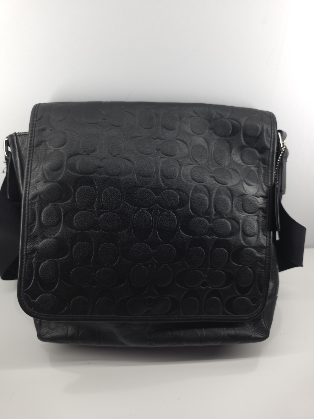 Coach Women’s Black Signature Embossed Messenger Bag